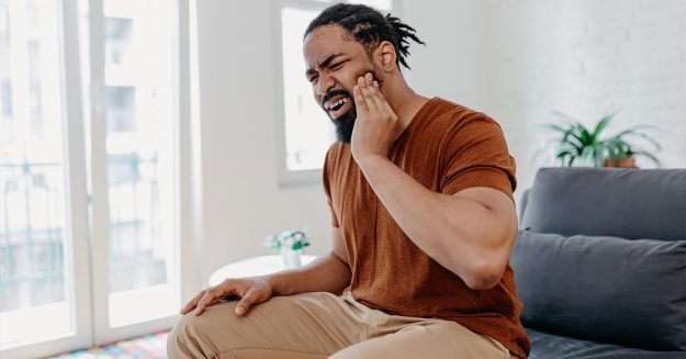 why do we have wisdom teeth